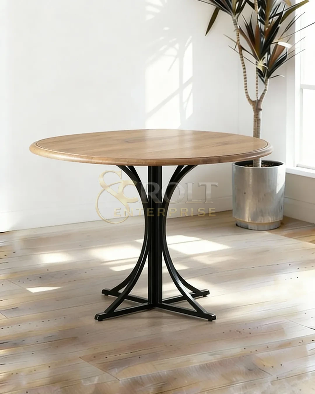 solid-wood-round-table-with-sculptural-metal-base